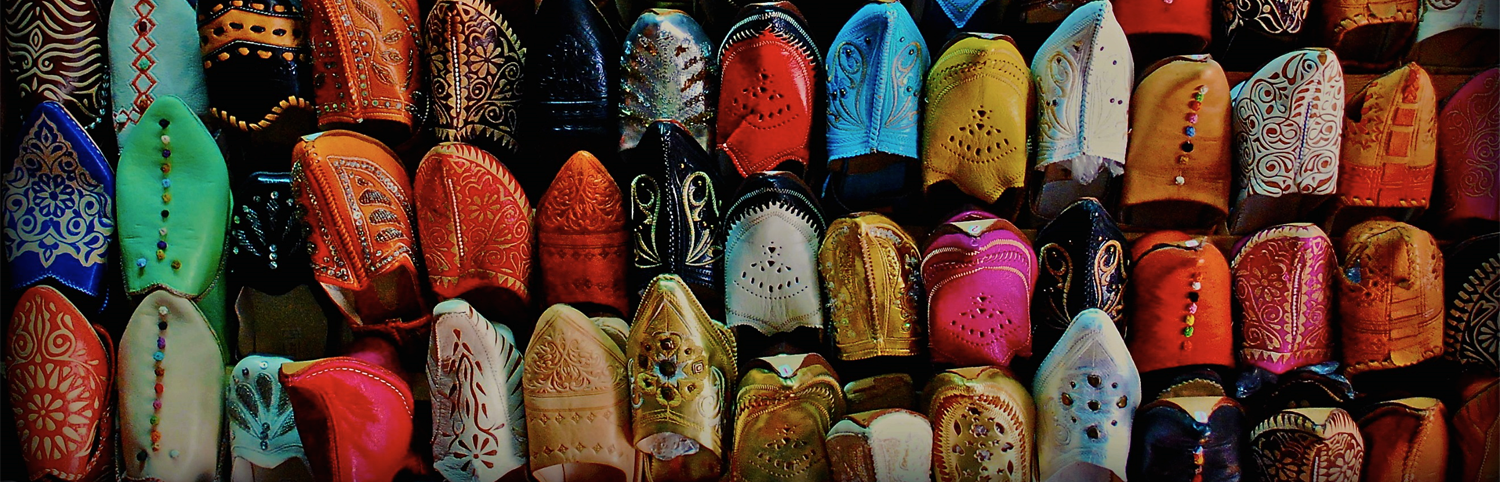 Hand crafted, colorful Morocco shoes on display in the market